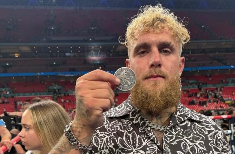 Jake Paul with coin of 128th Mountain Assault Brigade